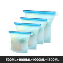 Load image into Gallery viewer, Reusable Food Storage Bags BPA Free 4-Pack Zip lock Silicone Food Bag Set Freezer &amp; Microwave Safe Washable Zip Lunch Baggies
